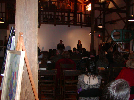 The auction room audience.