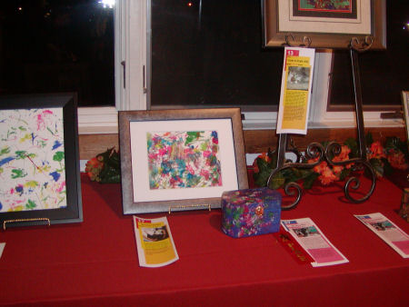 Paintings and a painted box appear in this photo.
